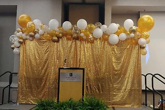 Gold Sequined Backdrop with Balloon Garland
