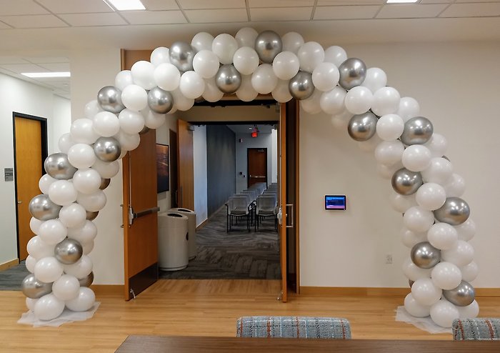 White Arch on a Frame with Pops of Silver